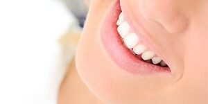 Healthy teeth, beautiful smile, young woman enamel