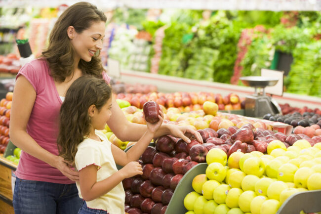 Mother and daughter shopping for fresh produce Children's Dentist San Diego